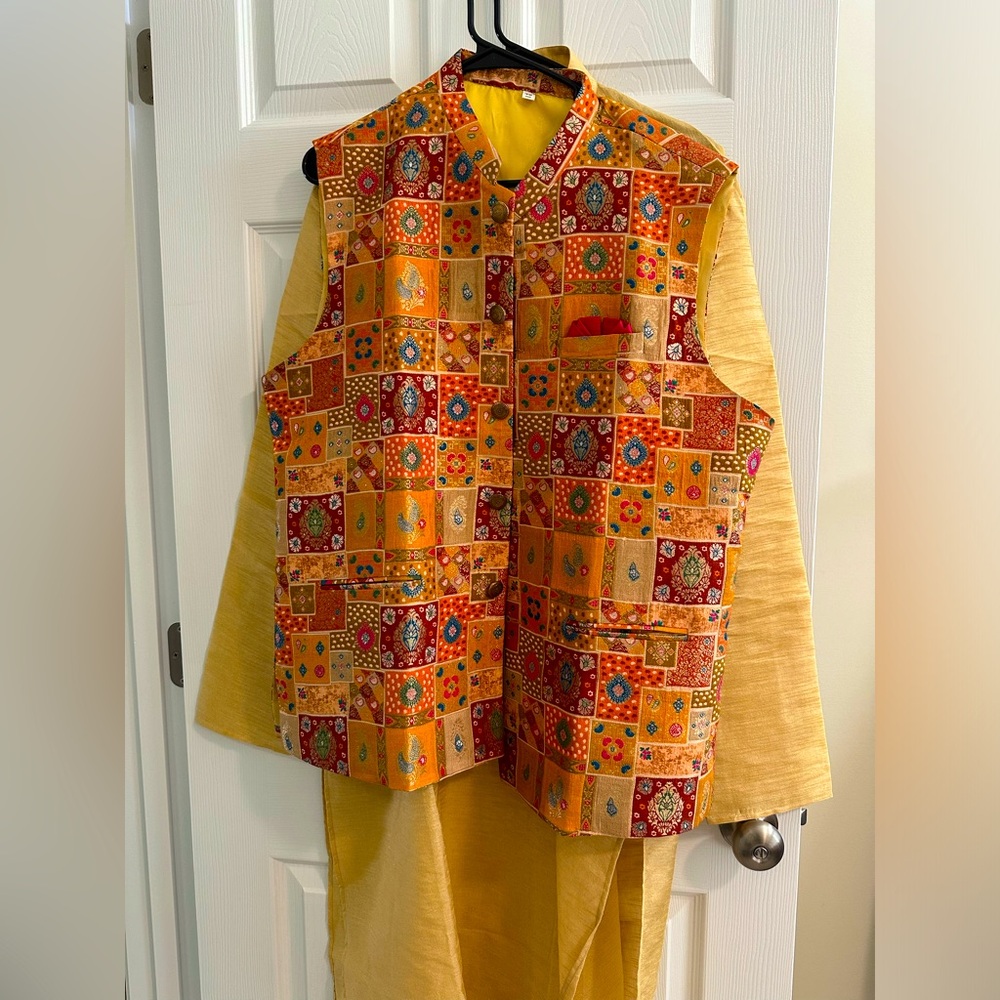 Golden color Kurta with chudidar and multicolor jacket